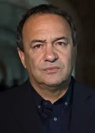 Mimmo Lucano e il Modello di Accoglienza di Riace image 1