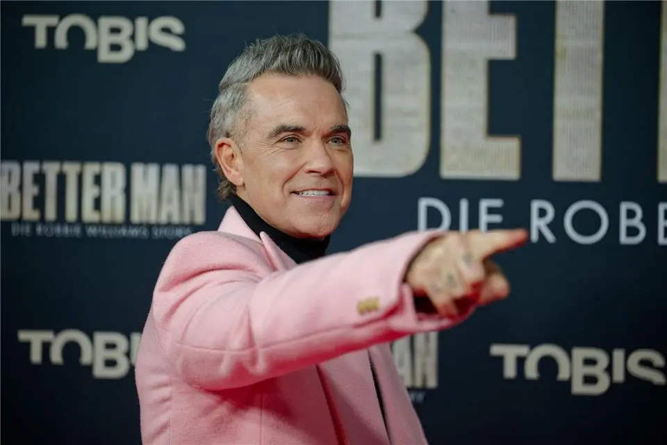 La carriera e i successi di Robbie Williams