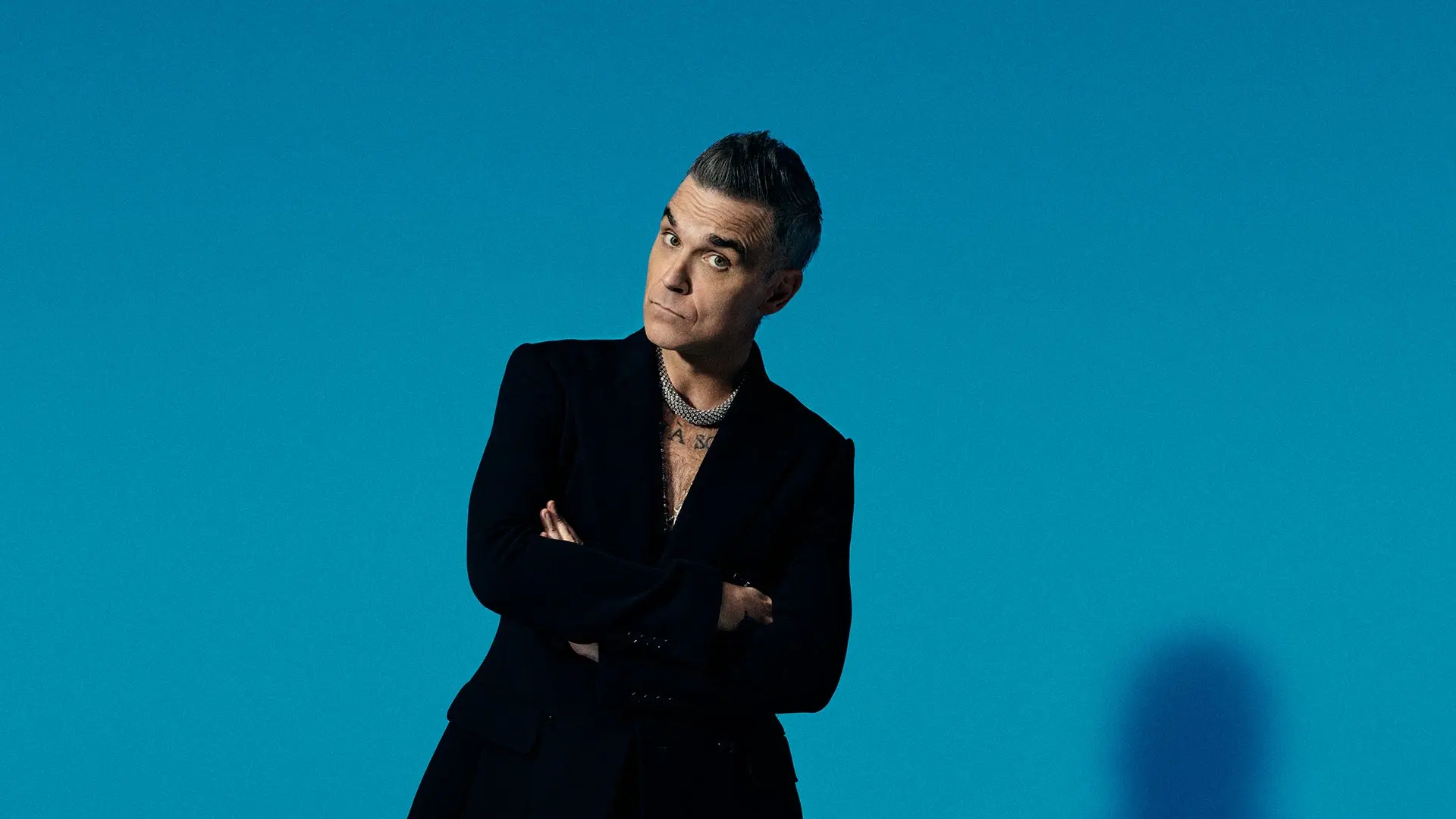 Robbie Williams e la sua influenza nella musica pop moderna