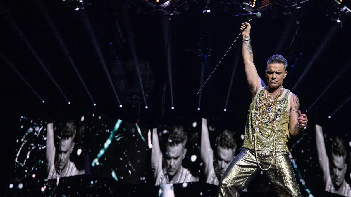 Robbie Williams: cosa è successo con il suo dente?